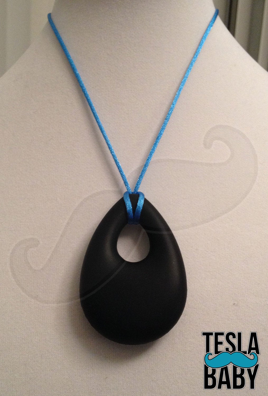 Silicone Pendant Necklace -- 3 7/8" x 2" pink silicone teardrop pendant; for fidgeting, sensory play, teething.