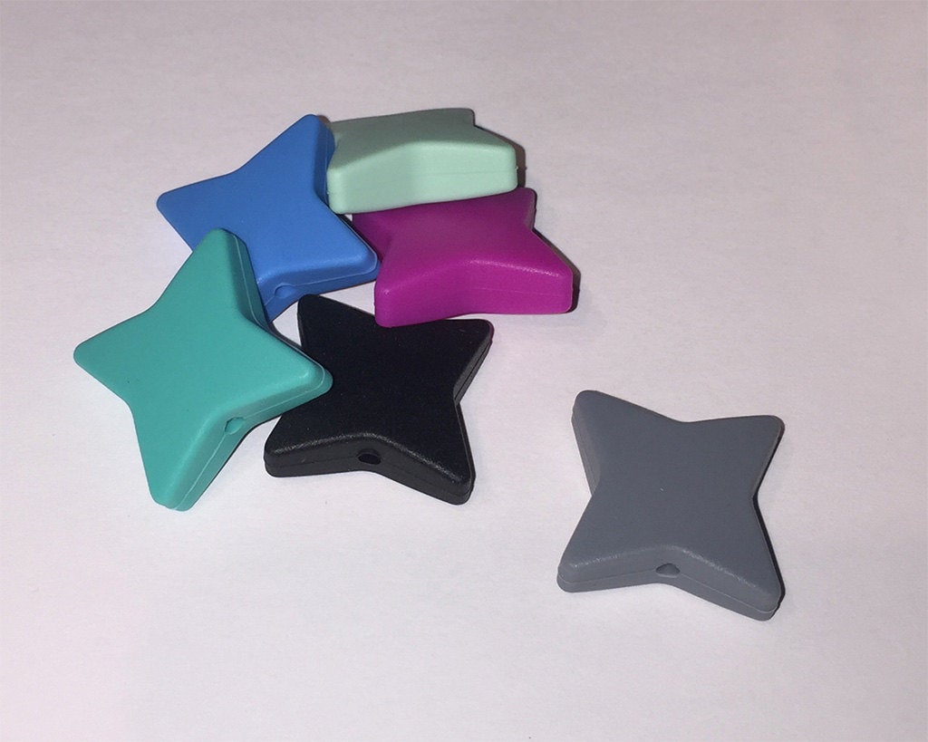 5-15 Magenta Silicone Ninja Beads - 1 1/8" Four pointed stars.